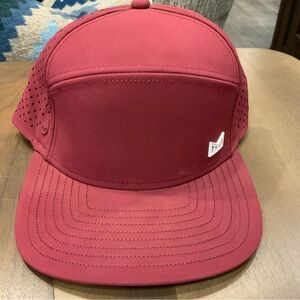 Melin Hydro Trenches Icon snapback hat in maroon.